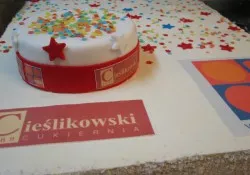 Tort firmowy Ken Center