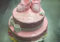 Tort piętrowy na chrzest z bucikami